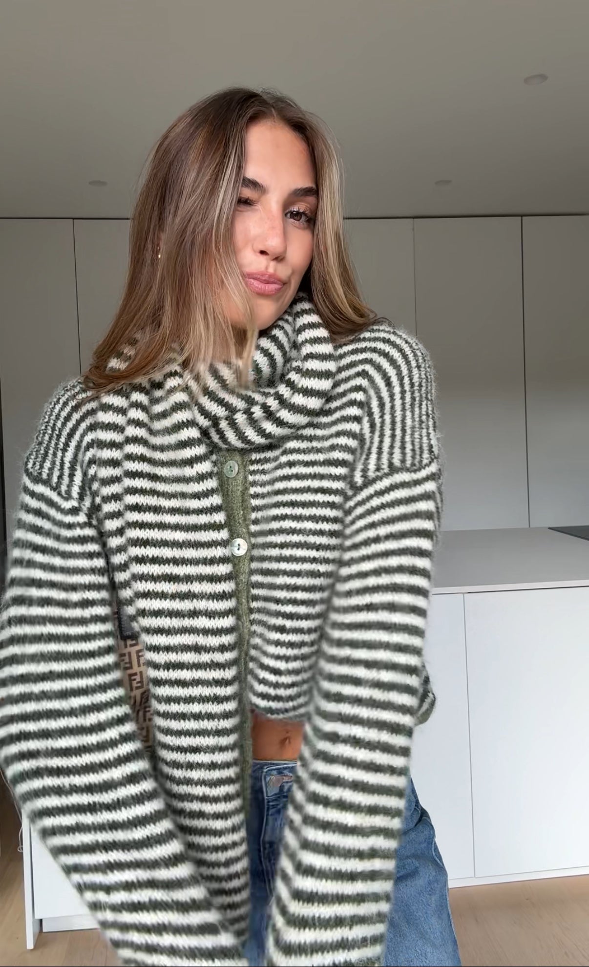 Soft striped cardigan in a muted color