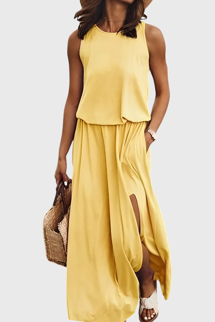Dianne Sleeveless dress with side slit and loose silhouette