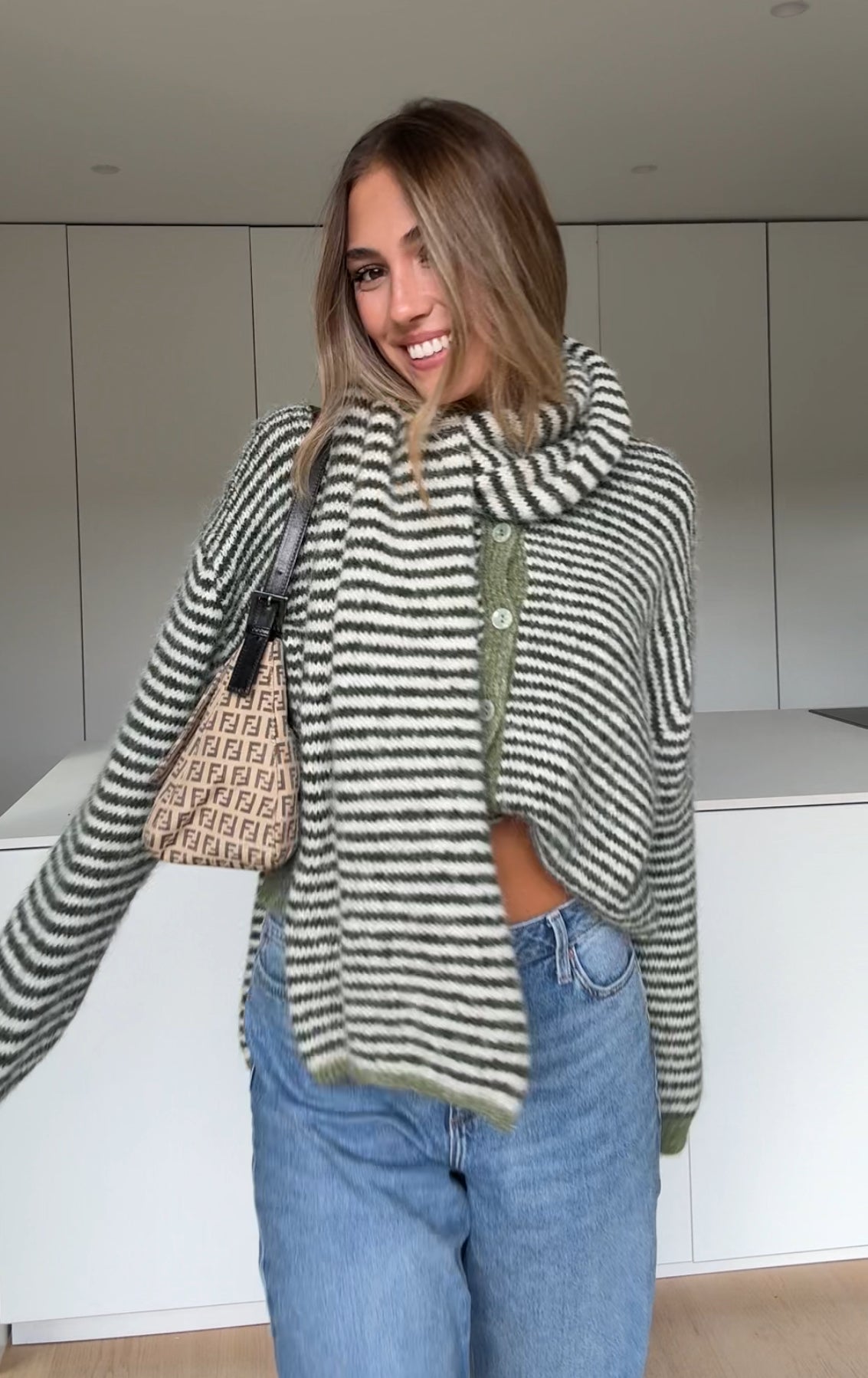 Soft striped cardigan in a muted color
